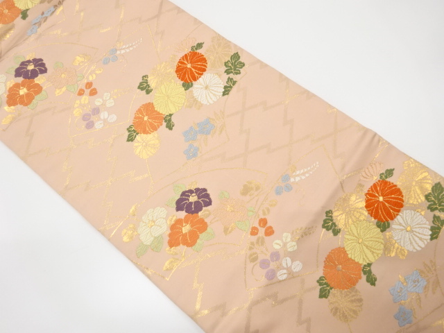 地紙に菊・椿・秋草模様織り出し名古屋帯